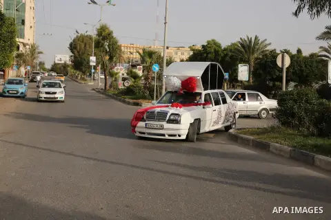A Palestinian mechanic display his "Cinderella" vehicle in Gaza City on April 22, 2017. Made up of five different cars, it will be rented out for use at marriage ceremonies. Photo by Ashraf Amra