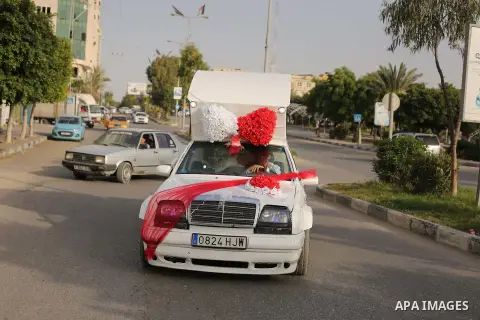 A Palestinian mechanic display his "Cinderella" vehicle in Gaza City on April 22, 2017. Made up of five different cars, it will be rented out for use at marriage ceremonies. Photo by Ashraf Amra