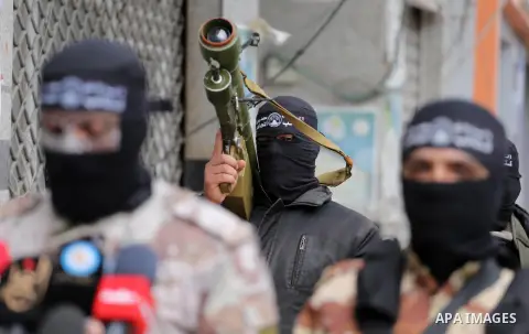 Members of al-Mujahideen brigades, the military wing of al-Mujahideen movement, attend a press conference, in Gaza city on April 24, 2017. Photo by Mohammed Asad