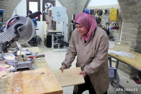 A Palestinian woman works at at a carpentry in Beit Lahia in the northern Gaza strip on Feb. 14, 2017. More than 8 woman works at carpentry to help their husbands as the Israeli blockade of the Gaza Strip continues. They...