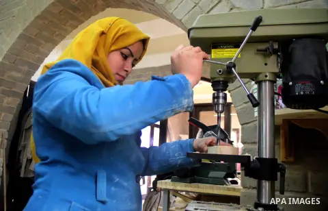 Ghadir Tayeh, 26, a Palestinian woman works at a carpentry in Beit Lahia in the northern Gaza strip on Feb. 14, 2017. Tayeh works on carpentry alongside with another 8 woman to help their husbands as the Israeli blockade...