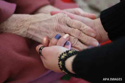 A Palestinian nurse provides treatment for an elderly Palestinian woman at El Wafa elderly nursing home, in Gaza city on Feb. 12, 2017. El Wafa elderly nursing home was established in 1980 as one of programs of Al-Wafa c...