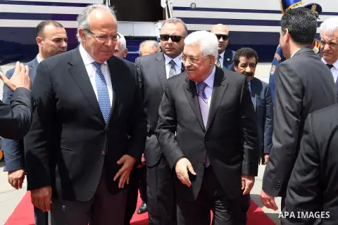 Palestinian President Mahmoud Abbas upon his arrival in Cairo, Egypt on April 29, 2017. Photo by Osama Falah