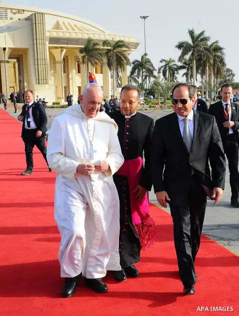 Egyptian President Abdel Fattah Sisi bids farewell to Pope Francis at Cairo International Airport in Cairo on April 29, 2017. Pope Francis led a jubilant mass for thousands of Egyptian Catholics during a visit to support...
