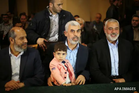 Senior political leaders of the Islamist movement, Ismail Haniyeh and Yahya Sinwar, the new leader of Hamas in the Gaza Strip attend a meeting to announce Hamas political document (the document of general principles and...