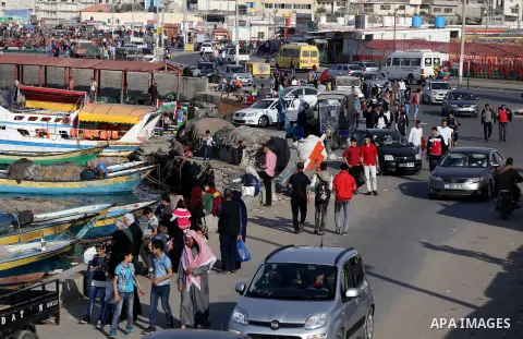 Palestinians enjoy their time off the beach of Gaza City on May 5, 2017. Photo by Mohammed Asad