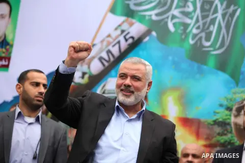 (FILES) This file photo taken on December 12, 2014 shows Senior Hamas leader Ismail Haniyeh, takes part in a rally ahead of the 27th anniversary of the movement founding, in Jabaliya in the northern Gaza Strip. Ismail Ha...