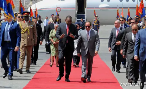 Egyptian President Abdel Fattah al-Sisi welcomes Kenyan President Uhuru Kenyatta upon his arrival at Cairo's international airport in Cairo, Egypt, on May 10, 2017. Photo by Egyptian President Office