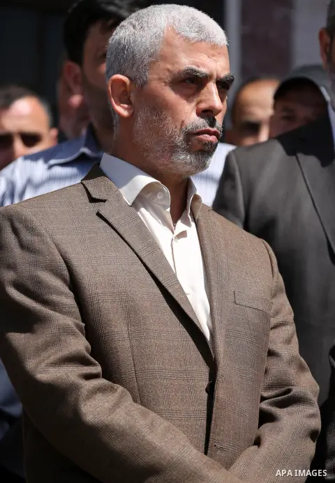 Yahya Sinwar, the new leader of Hamas in the Gaza Strip attends a press conference in Gaza City on May 11, 2017, in which the group announced the arrest of the suspected murderer of one of its key military commanders, Ma...