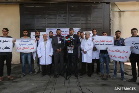 Director General of Pharmacy in the Ministry of Health, Mounir El Barsh, speaks to media during a protest against decision of Palestinian Authority halting shipments of baby formula and medicines to hospitals on Gaza str...