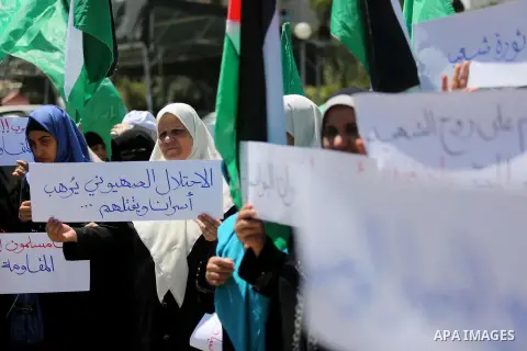 Palestinian women supporter Hamas movement take part during a protest against U.S. President Donald Trump comments linking Hamas with terrorism and support of prisoners refusing food in Israeli jails in Gaza city on May...