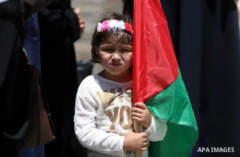 Palestinian women supporter Hamas movement take part during a protest against U.S. President Donald Trump comments linking Hamas with terrorism and support of prisoners refusing food in Israeli jails in Gaza city on May...