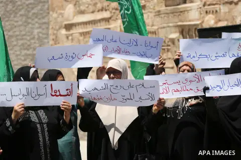 Palestinian women supporter Hamas movement take part during a protest against U.S. President Donald Trump comments linking Hamas with terrorism and support of prisoners refusing food in Israeli jails in Gaza city on May...
