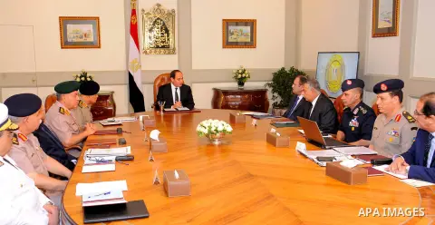 Egyptian President Abdel Fattah al-Sisi meets with leaders of the Supreme Council of the Armed Forces and the Supreme Council for Police after the gunmen attack in Minya, at the Ittihadiya presidential palace in Cairo, E...