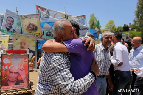 Palestinians celebrate after Palestinian prisoners in Israeli jails suspend hunger strike, in Gaza city on May 27, 2017. Hundreds of Palestinian prisoners on Saturday ended a 40-day hunger strike over conditions in Israe...