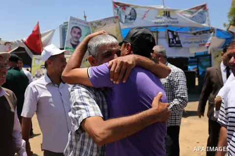 Palestinians celebrate after Palestinian prisoners in Israeli jails suspend hunger strike, in Gaza city on May 27, 2017. Hundreds of Palestinian prisoners on Saturday ended a 40-day hunger strike over conditions in Israe...