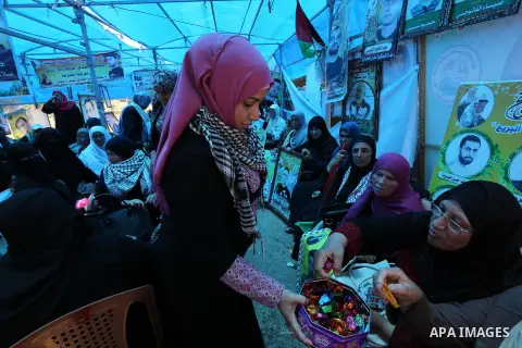 Palestinians celebrate after Palestinian prisoners in Israeli jails suspend hunger strike, in Gaza city on May 27, 2017. Hundreds of Palestinian prisoners on Saturday ended a 40-day hunger strike over conditions in Israe...