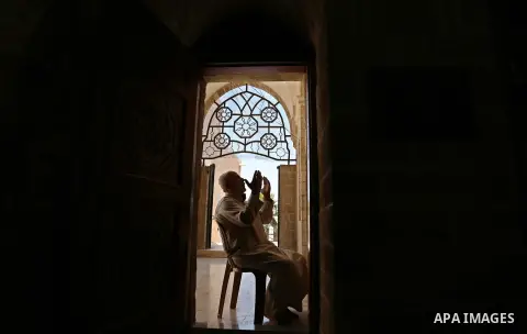 A Palestinian man prays on the Muslim holy fasting month of Ramadan at the al- Sayed Hashim mosque in Gaza city on May 29, 2017. Ramadan is sacred to Muslims because it is during that month that tradition says the Koran...