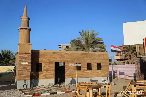 A Picture shows a wooden sculpture of Hussein mosque at a technical site in the southern Gaza Strip town of Rafah, near the border with Egypt, on June 1, 2017. Young artists Palestinian artists Nidal Al-Jarami and Wissam...