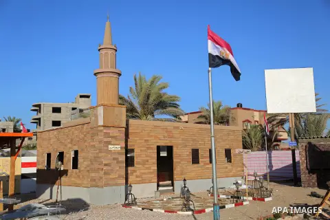 A Picture shows a wooden sculpture of Hussein mosque at a technical site in the southern Gaza Strip town of Rafah, near the border with Egypt, on June 1, 2017. Young artists Palestinian artists Nidal Al-Jarami and Wissam...