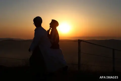 Samaritan children arrive to pray on the top of Mount Gerizim in a traditional pilgrimage to mark the Shavuot's holiday at dawn near the West Bank city of Nablus June 4, 2017 which is giving of the Torah at Mount Sinai s...