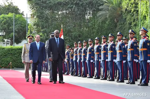 Egyptian President Abdel Fattah al-Sisi and President of Burkina Faso, Roch Marc Christian Kabore review the honor guards in Cairo, Egypt, on June 07, 2017. Photo by Egyptian President Office