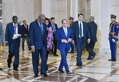 Egyptian President Abdel Fattah al-Sisi walks alongside with President of Burkina Faso, Roch Marc Christian Kabore in Cairo, Egypt, on June 07, 2017. Photo by Egyptian President Office