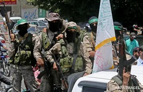 Members of the Ezzedine al-Qassam Brigades, the military wing of the Palestinian Islamist movement Hamas, attend the funeral of their comrade Ibrahim Abu Al-Naja in Rafah, southern Gaza Strip June 8, 2017. Photo by Ashra...