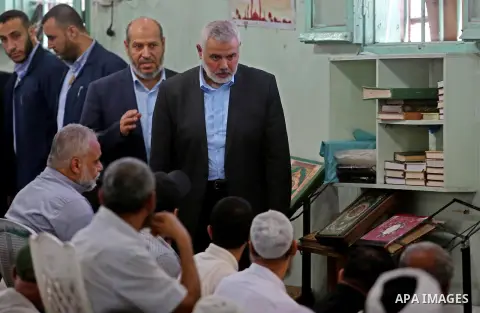 Ismail Haniyeh, leader of Hamas, attends the funeral of a member the Ezzedine al-Qassam Brigades, the military wing of the Palestinian Islamist movement Hamas of Ibrahim Abu Al-Naja, in Rafah, southern Gaza Strip June 8,...
