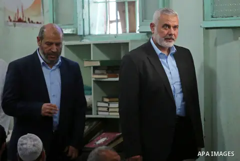 Ismail Haniyeh, leader of Hamas, attends the funeral of a member the Ezzedine al-Qassam Brigades, the military wing of the Palestinian Islamist movement Hamas of Ibrahim Abu Al-Naja, in Rafah, southern Gaza Strip June 8,...