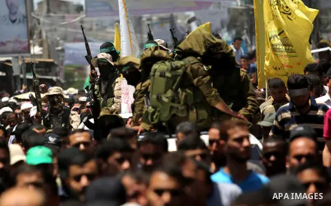 Palestinians attend the funeral of a member the Ezzedine al-Qassam Brigades, the military wing of the Palestinian Islamist movement Hamas of Ibrahim Abu Al-Naja, in Rafah, southern Gaza Strip June 8, 2017. Photo by Ashra...