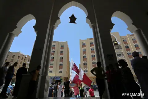 Palestinians take part in a rally in support of Qatar, inside Qatari-funded construction project 'Hamad City', in Khan Younis in the southern Gaza Strip, June 9, 2017. Photo by Ashraf Amra