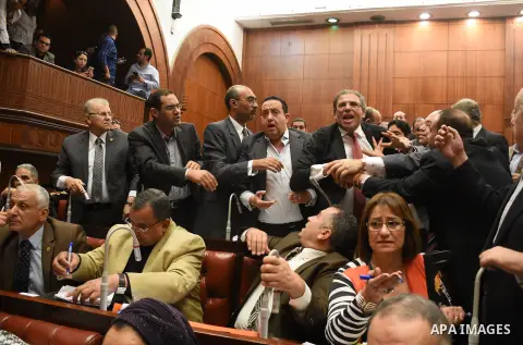 Members of legislative committee in Egypt's parliament attend a meeting to discuss a government agreement to hand over two Red Sea islands Tiran and Sanafir to Saudi Arabia, in Cairo, Egypt, on June 12, 2017. Photo by St...