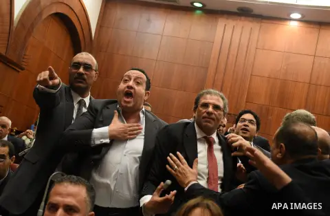 Members of legislative committee in Egypt's parliament attend a meeting to discuss a government agreement to hand over two Red Sea islands Tiran and Sanafir to Saudi Arabia, in Cairo, Egypt, on June 12, 2017. Photo by St...