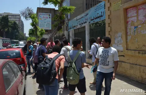Egyptian students leave their school following a high school exams in Cairo, Egypt, on June 13, 2017. Photo by Amr Sayed