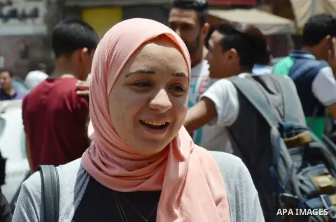 Egyptian students react following a high school exams in Cairo, Egypt, on June 13, 2017. Photo by Amr Sayed