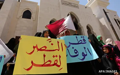Palestinian women take part in a rally in support of Qatar, inside Qatari-funded construction project 'Hamad City', in Khan Younis in the southern Gaza Strip, June 14, 2017. Photo by Ashraf Amra