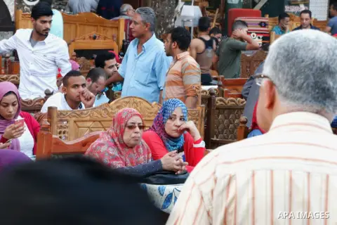 Egyptian muslims take their breakfast during the holy fasting month of Ramadan in front of al-Hussein mosque at Al-Azhar district in old Islamic Cairo, Egypt, on June 17, 2017. Ramadan is sacred to Muslims because it is...