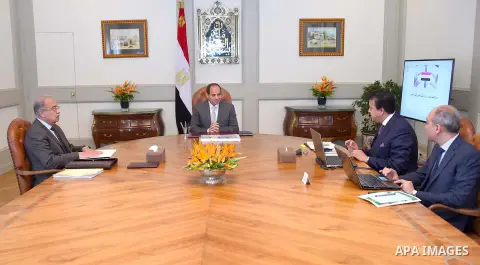 Egyptian President Abdel Fattah al-Sisi meets with Prime Minister Sharif Ismail and Minister of Higher Education Khalid Abdul Ghaffar, in Cairo, Egypt, on June 17, 2017. Photo by Egyptian President Office