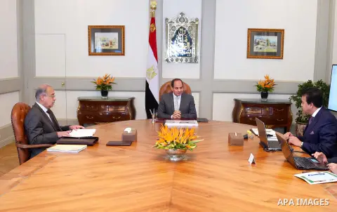Egyptian President Abdel Fattah al-Sisi meets with Prime Minister Sharif Ismail and Minister of Higher Education Khalid Abdul Ghaffar, in Cairo, Egypt, on June 17, 2017. Photo by Egyptian President Office
