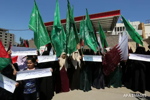 Palestinian women take part in a rally in support of Qatar and against the blockade on the Gaza Strip, in front of the Legislative Council in Gaza city on June 18, 2017. Photo by Ashraf Amra