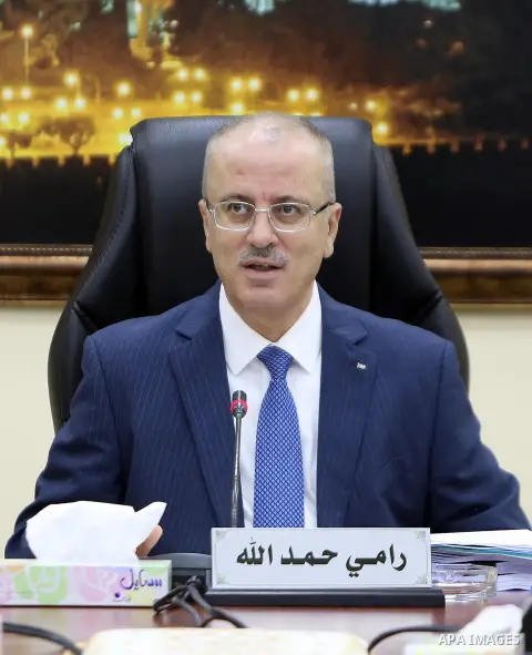 Palestinian Prime Minister Rami Hamdallah chairs a meeting of council of Ministers in the West Bank city of Ramallah, on June 20, 2017. Photo by Prime Minister Office