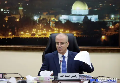 Palestinian Prime Minister Rami Hamdallah chairs a meeting of council of Ministers in the West Bank city of Ramallah, on June 20, 2017. Photo by Prime Minister Office