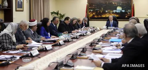 Palestinian Prime Minister Rami Hamdallah chairs a meeting of council of Ministers in the West Bank city of Ramallah, on June 20, 2017. Photo by Prime Minister Office