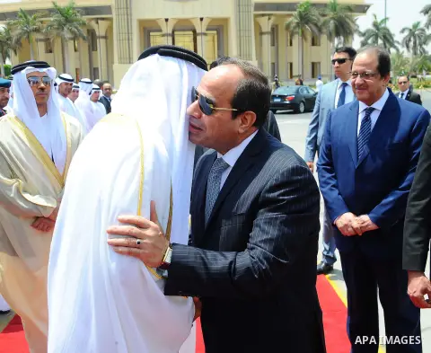 Egyptian President Abdel Fattah Sisi bids farewell to bu Dhabi Crown Prince Sheikh Mohammed bin Zayed al-Nahyan at Cairo International Airport in Cairo on June 20, 2017. Photo by Egyptian President Office