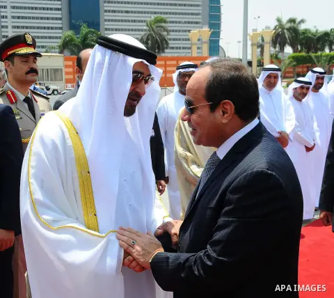 Egyptian President Abdel Fattah Sisi bids farewell to bu Dhabi Crown Prince Sheikh Mohammed bin Zayed al-Nahyan at Cairo International Airport in Cairo on June 20, 2017. Photo by Egyptian President Office