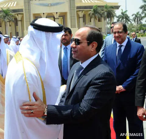 Egyptian President Abdel Fattah Sisi bids farewell to bu Dhabi Crown Prince Sheikh Mohammed bin Zayed al-Nahyan at Cairo International Airport in Cairo on June 20, 2017. Photo by Egyptian President Office