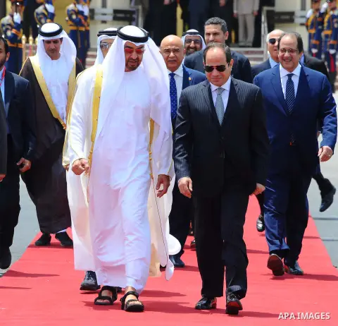 Egyptian President Abdel Fattah Sisi bids farewell to bu Dhabi Crown Prince Sheikh Mohammed bin Zayed al-Nahyan at Cairo International Airport in Cairo on June 20, 2017. Photo by Egyptian President Office