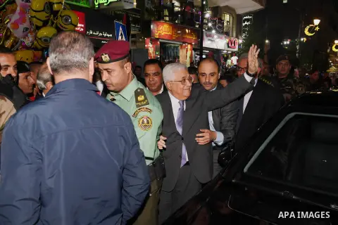Palestinian President Mahmoud Abbas roams at the streets on the West Bank city of Ramallah on June 20, 2017. Photo by Thaer Ganaim
