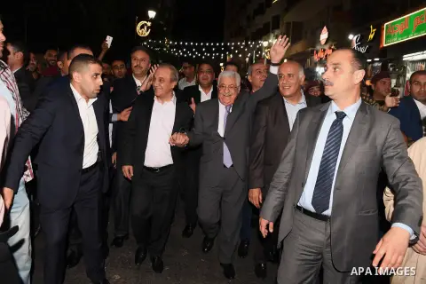 Palestinian President Mahmoud Abbas roams at the streets on the West Bank city of Ramallah on June 20, 2017. Photo by Thaer Ganaim